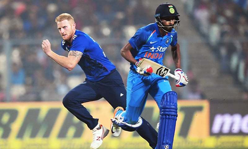 India's Hardik Pandya runs to complete a run as England's Ben Stokes fields the ball.-AFP