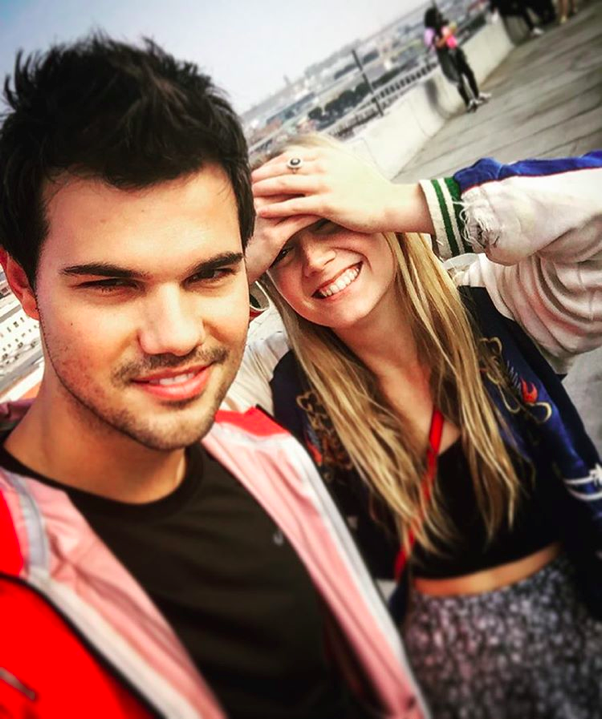 Featured in the image is Taylor Lautner and Billie Lourd