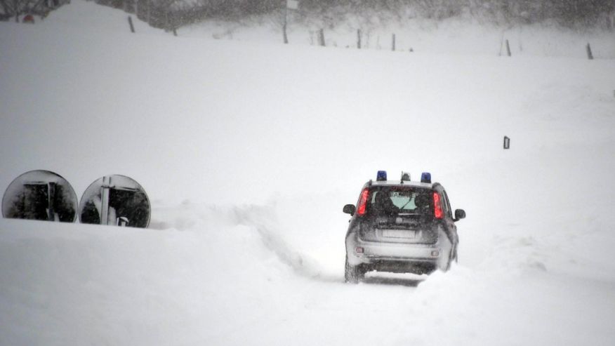 Jan. 18 2016 A Carabinieri car makes its way through snow in Amatrice central Italy