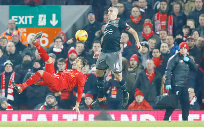 Liverpool’s Roberto Firmino attempts an overhead kick during their League Cup match against Southampton at Anfield Wednesday.- Reuters