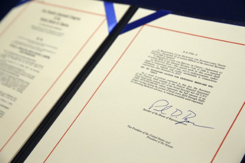 A bill repealing Obamacare sits on a desk after being signed by Ryan at the U.S. Capitol in Washington