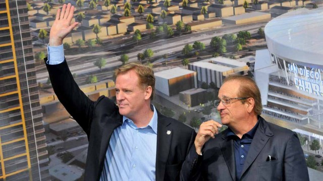 NFL Commissioner Roger Goodell and Chargers Chairman Dean Spanos acknowledge a crowd of fans