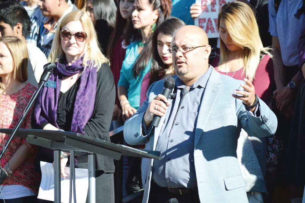 Joe Salazar speaks at a rally that he helped organize on the west steps of the State Capitol on Nov. 10. Salazar a Democrat led the rally which was a stand of solidarity with communities that he says were targeted by President Donald Trump during his 2