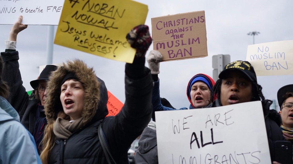 Protesters assemble at John F. Kennedy International Airport in New York Saturday Jan. 28 2017