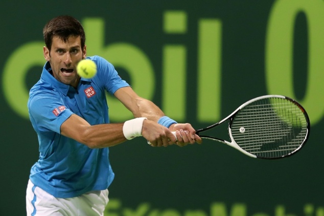 Serbia's Novak Djokovic returns the ball to Spain's Fernando Verdasco during their Qatar Open semi-final in Doha