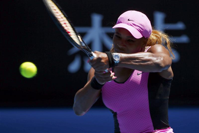 Serena Williams of the U.S. hits a return to Daniela Hantuchova of Slovakia during their women's singles matchat the Australian Open 2014