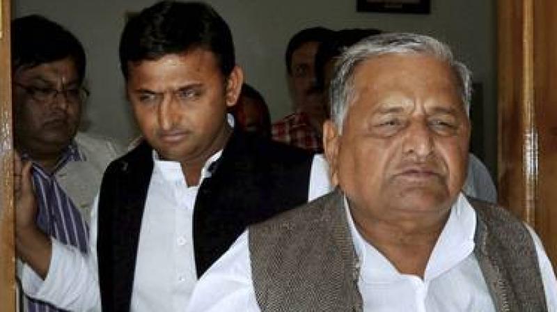 Uttar Pradesh Chief Minister Akhilesh Yadav and Samajwadi Party supremo Mulayam Singh Yadav