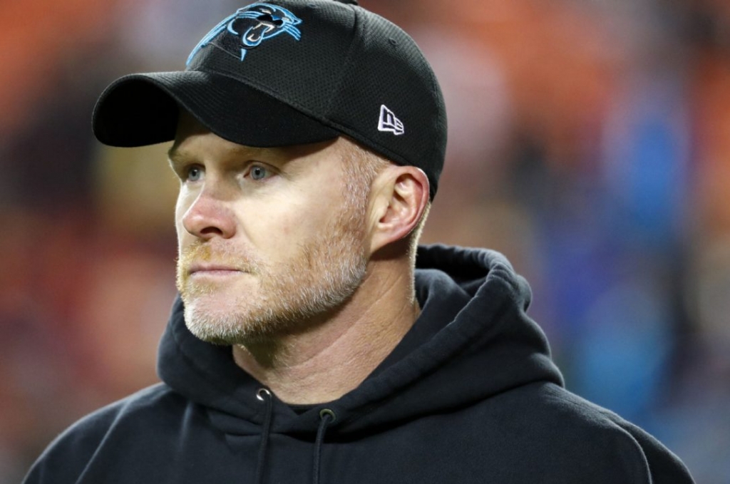 Carolina Panthers defensive coordinator Sean Mc Dermott walks across the field before an NFL football game against Washington in Landover Maryland on Dec. 19 2016. A person with direct knowledge of the decision tells The Associated Press the Buffalo Bi