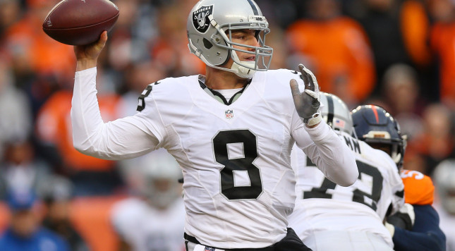 DENVER CO- JANUARY 1 Quarterback Connor Cook #8 of the Oakland Raiders throws in the second quarter of the game against the Denver Broncos at Sports Authority Field at Mile High