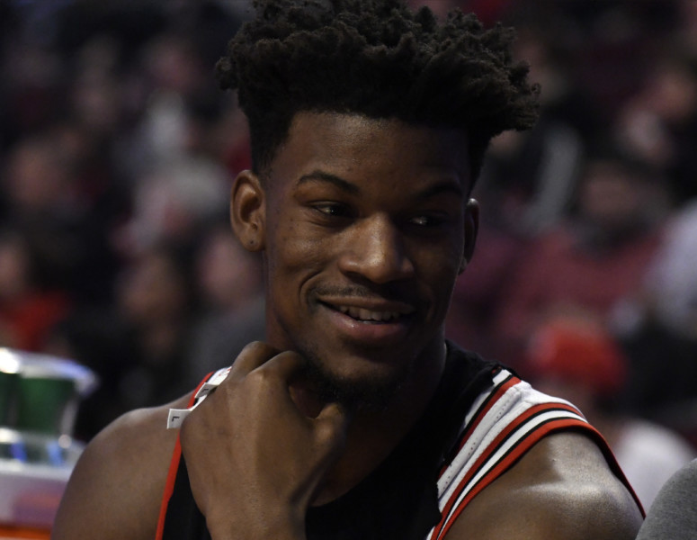 Chicago Bulls forward Jimmy Butler sits on the bench during the first quarter of a game against the Miami Heat in an NBA basketball game in Chicago Friday Jan. 27 2017. Butler was taken out of the starting lineup for comments he made after a loss