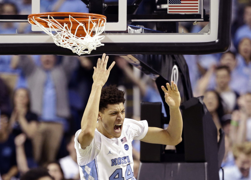 Rick Pitino had to be held back from furiously confronting a UNC fan