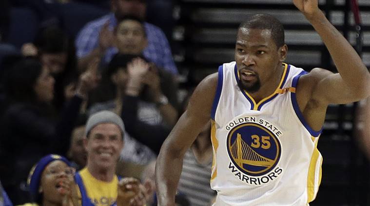 Golden State Warriors Kevin Durant celebrates a score against the Sacramento Kings during the second half of an NBA basketball game Wednesday Feb. 15 2017 in Oakland Calif