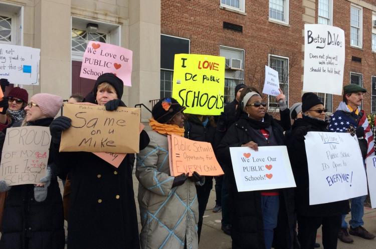 Protesters at Jefferson Middle School Academy in Washington chased Education Secretary Betsy De Vos on Friday but she later entered through another door