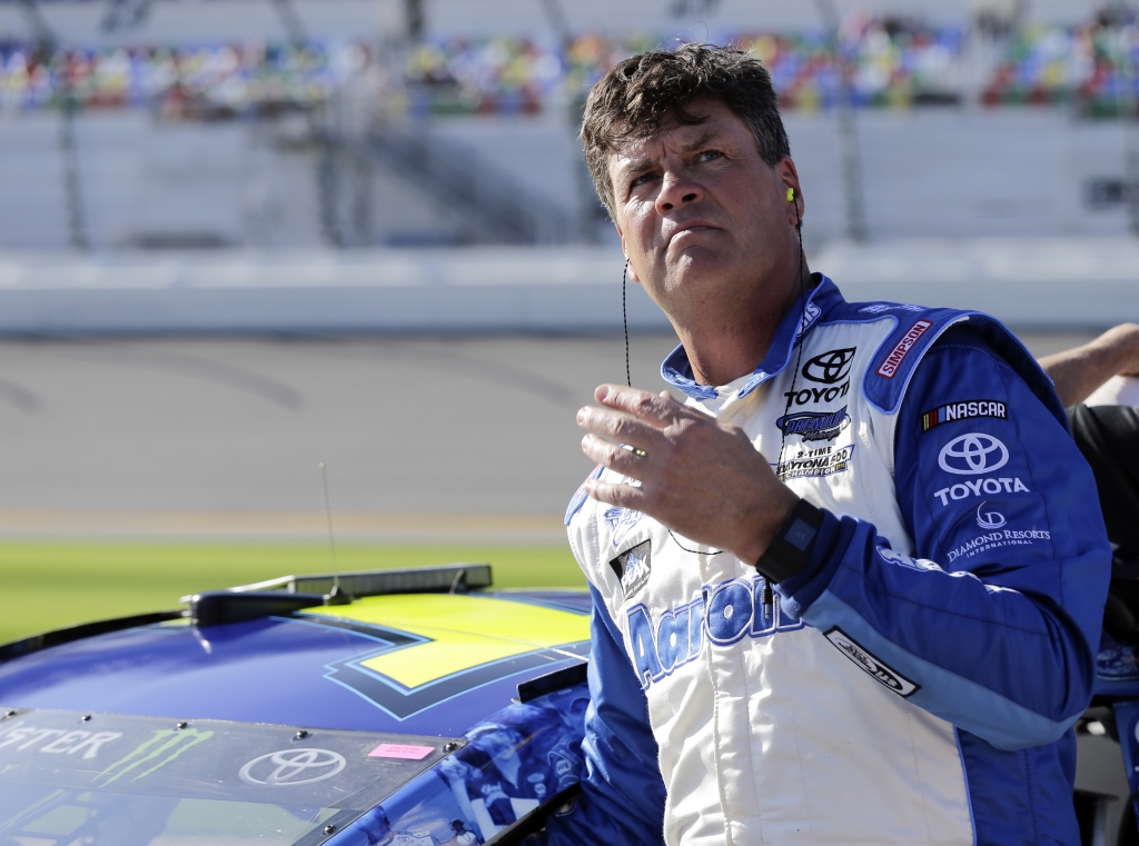 Michael Waltrip scans the leader board after his Sunday qualifying run for the Daytona 500. He was not terribly pleased putting up the 35th fastest time