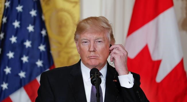 President Donald Trump listens during a joint news conference with Canadian Prime Minister Justin Trudeau in the East Room of the White House in Washington Monday Feb. 13 2017