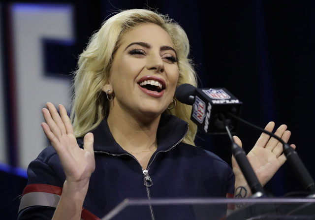 Lady Gaga answers questions at a news conference for the NFL Super Bowl 51 football game Thursday Feb. 2 2017 in Houston