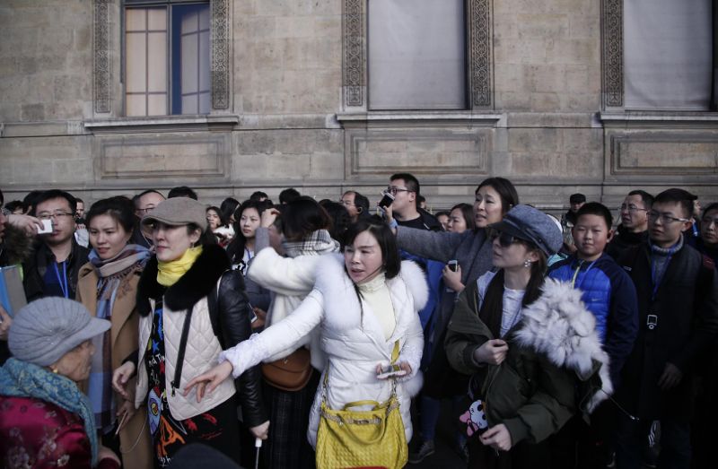 On-duty soldier 'opens fire after knife-wielding man tries to enter Paris Louvre Museum with suitcase'