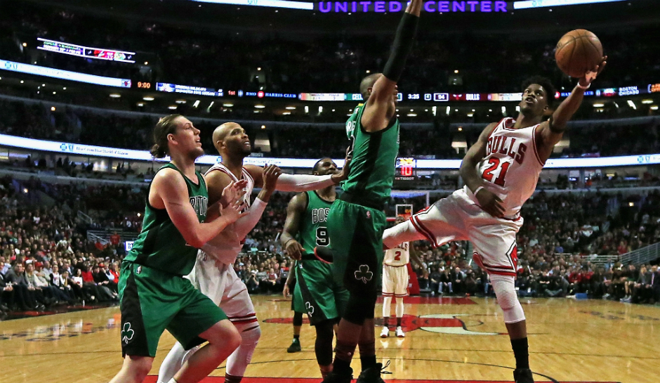 Jimmy Butler of the Chicago Bulls attempts a shot against the Boston Celtics this NBA season