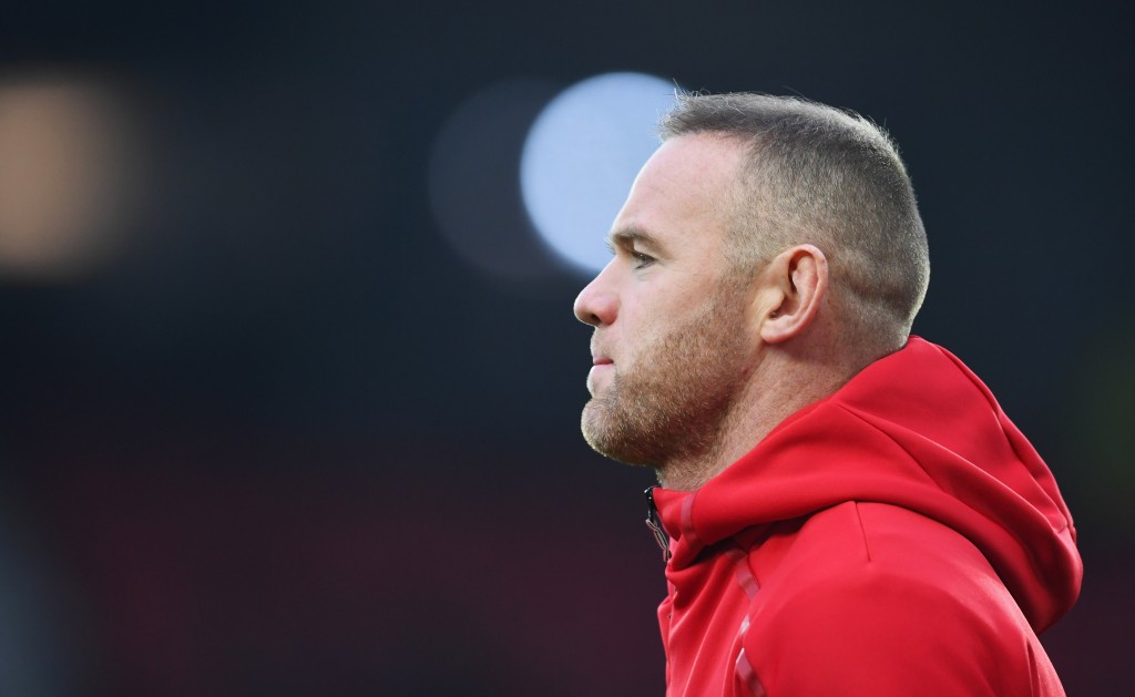 MANCHESTER ENGLAND- JANUARY 29 Wayne Rooney of Manchester United warms up prior to the Emirates FA Cup Fourth round match between Manchester United and Wigan Athletic at Old Trafford