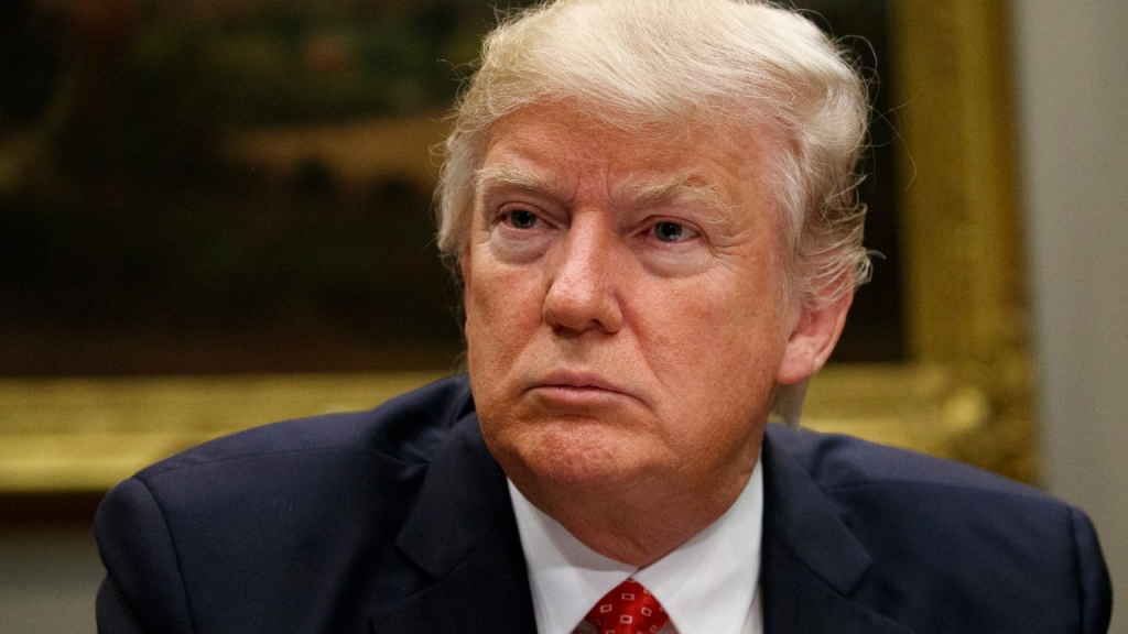 President Donald Trump listens during a meeting with county sheriffs in the Roosevelt Room of the White House in Washington Tuesday Feb. 7 2017