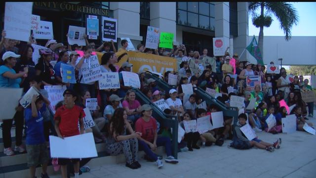 After Representatives Duck Town Halls, Protesters Bring Vigil To Their Doorsteps