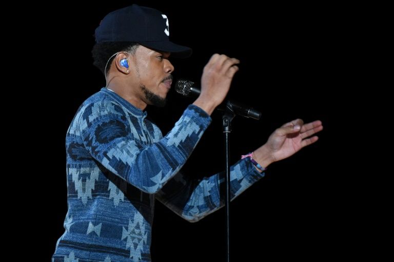 Chance the Rapper shown performing during the Grammy Awards has donated $1 million to Chicago's schoolsMore