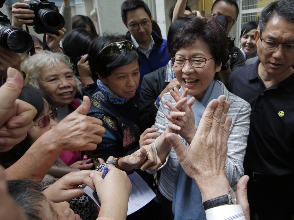 Activists march ahead of vote for Hong Kong leader