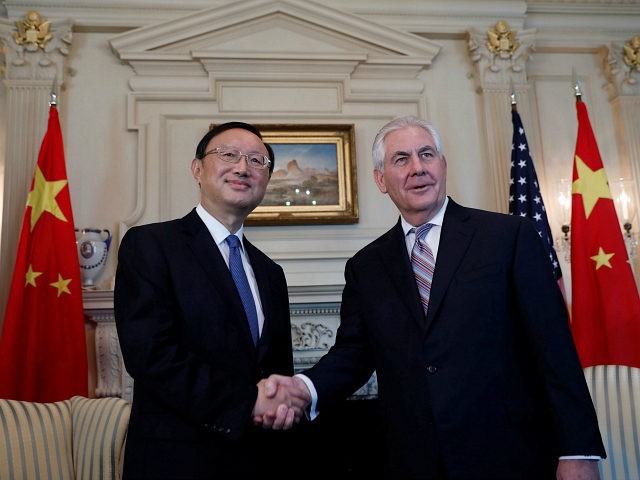 Secretary of State Rex Tillerson greets Chinese State Councilor Yang Jiechi at the State Department in Washington U.S