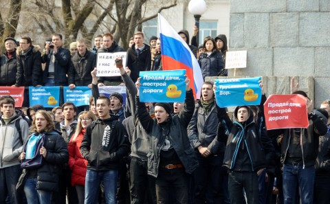 Dozens detained in anti-corruption protests across Russia