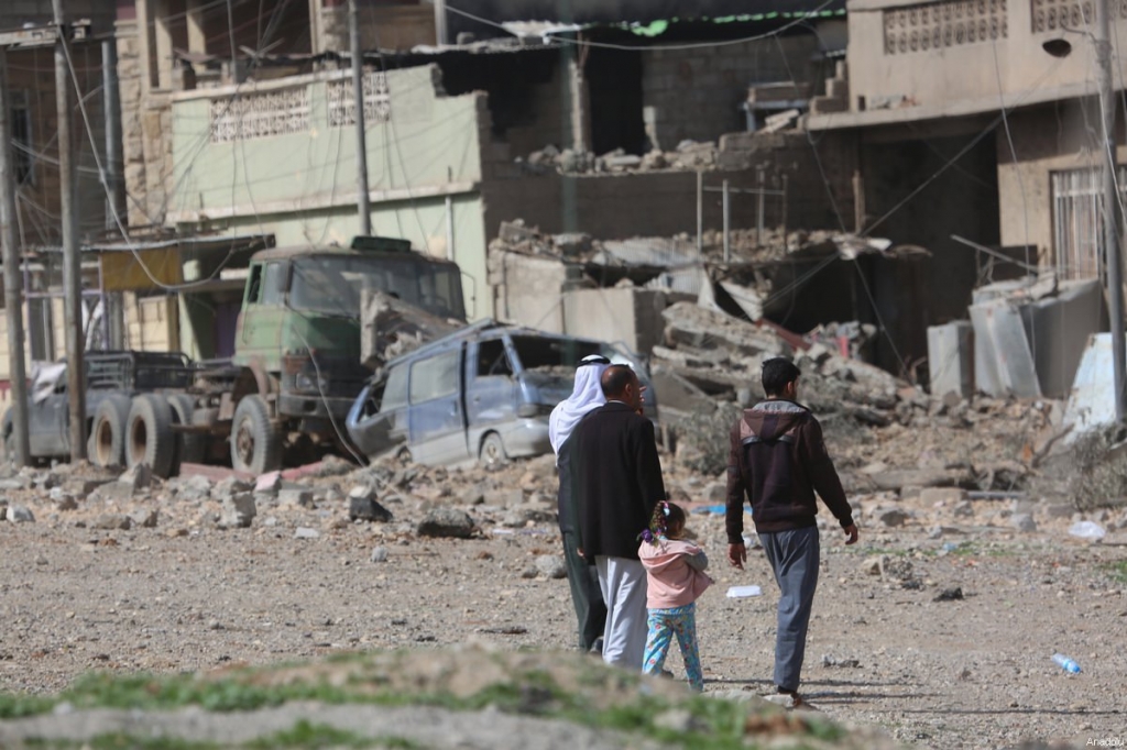 Collapsed buildings and damaged vehicles are seen during an operation to retake Mosul from Daesh in Samun neighbourhood as the clashes between Iraqi Army and Daesh continues in Mosul Iraq