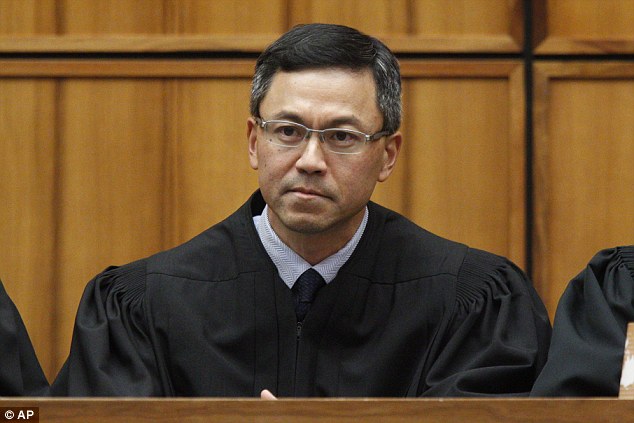 U.S. District Judge Derrick Watson has been asked to clarify his order blocking President Donald Trump's revised travel ban