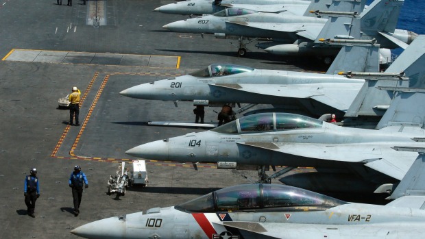 A row of F18 fighter jets on the deck of the USS Carl Vinson which has been diverted towards the Korean Peninsular from