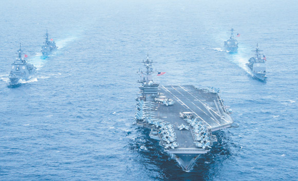 USS Carl Vinson, foreground guided-missile cruiser USS Lake Champlain, right-middle the Arleigh Burke-class guided-missile destroyer USS Michael Murphy, right-background the Japan Maritime Self Defense Force destroyer JS Ashi