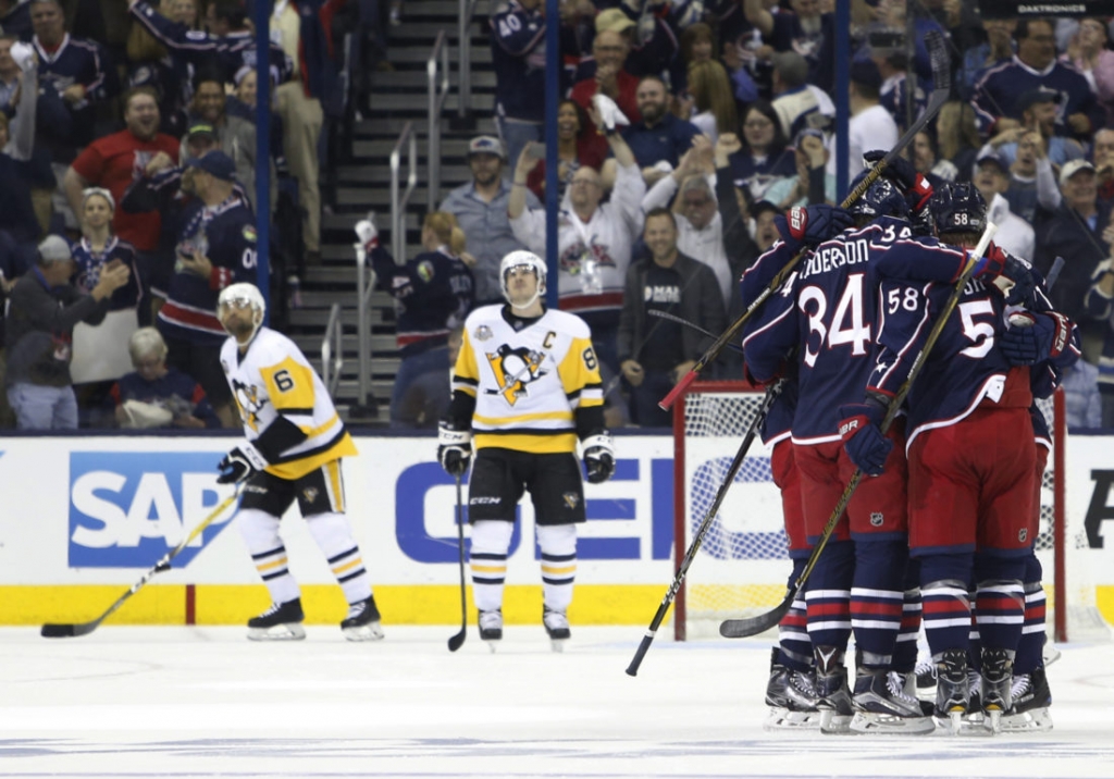 Columbus Blue Jackets celebrate a goal against the Pittsburgh Penguins during the first period of Game 4 of an NHL first-round hockey playoff series Tuesday