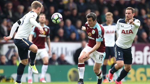 Christian Eriksen controls under pressure from Joey Barton