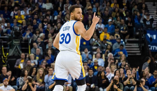 Apr 10 2017 Oakland CA USA Golden State Warriors guard Stephen Curry celebrates after a three point basket against the Utah Jazz during the first quarter at Oracle Arena