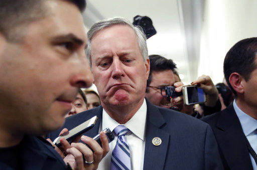 House Freedom Caucus Chairman Rep. Mark Meadows R-N.C. reacts to a reporters question on Capitol Hill in Washington