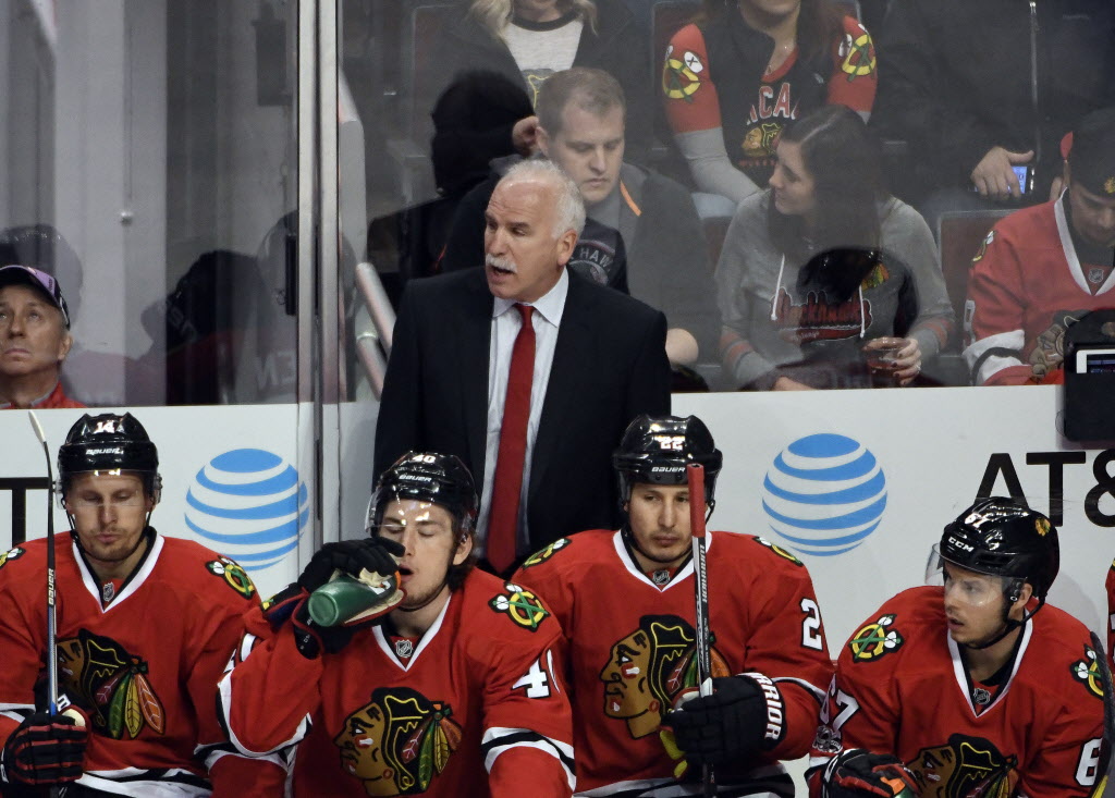 Joel Quenneville said the Blackhawks might have to dump-and-chase more to get past the Predators defense