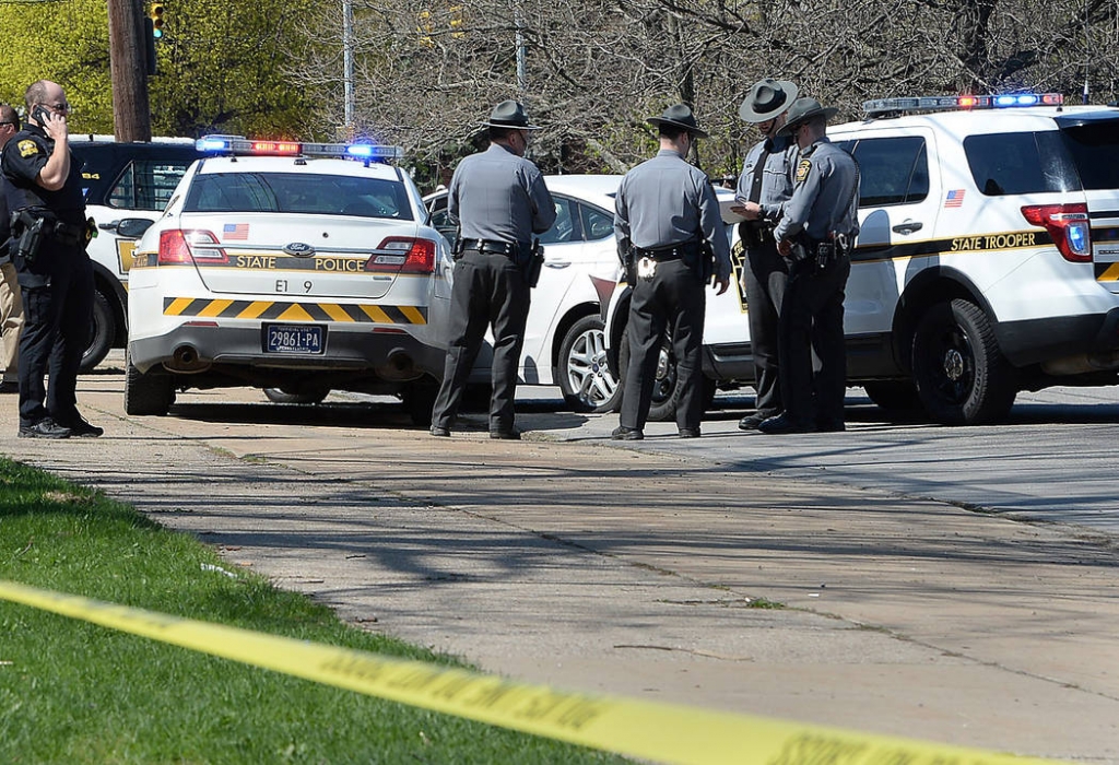 Pennsylvania State Police investigate the scene where Steve Stephens the suspect in the random killing of a Cleveland retiree posted on Facebook was found shot dead Tuesday