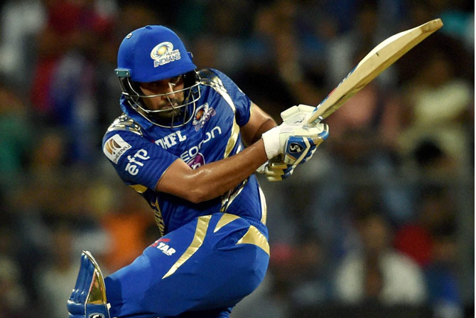 Mumbai Indians captain Rohit Sharma plays a shot against Rising Pune Supergiant. Pic AFP