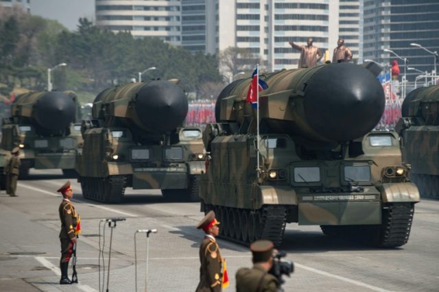 North Korea displayed nearly 60 missiles including what is suspected to be a new intercontinental ballistic missile at a parade in the capital