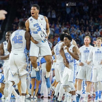 UNC senior forward Kennedy Meeks celebrates with his teammates