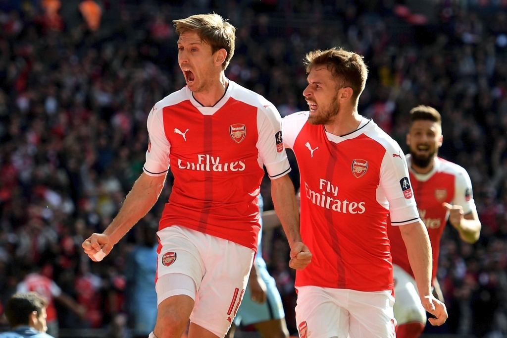 Ramsey right with Nacho Monreal hopes that Arsenal’s FA Cup semi-final win will ease the pressure on Wenger Shaun Botterill  Getty Images