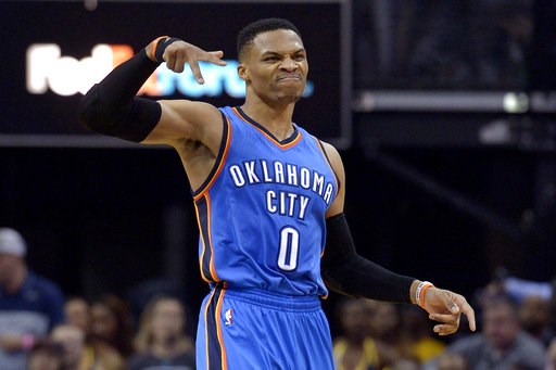 Oklahoma City Thunder guard Russell Westbrook gestures after scoring a 3-pointer during the second half of the team's NBA basketball game against the Memphis Grizzlies Wednesday