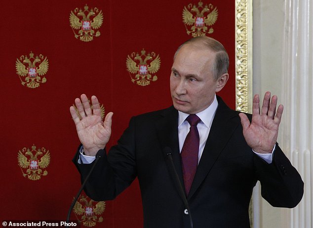 Russian President Vladimir Putin reacts during a joint press conference with Italian counterpart Sergio Mattarella after a meeting in Moscowís Kremlin Russia Tuesday