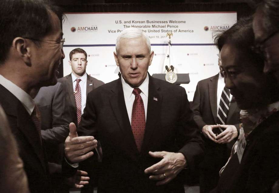 U.S. Vice President Mike Pence talks with members of the American Chamber of Commerce at the Grand Hyatt Hotel in Seoul South Korea Tuesday