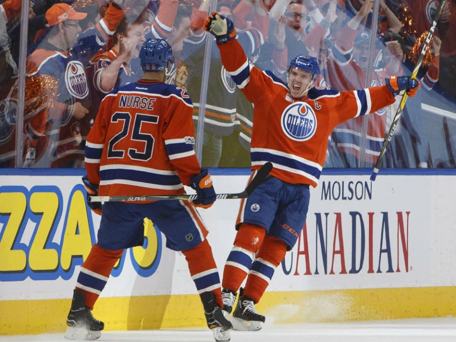 Connor McDavid right of the Edmonton Oilers celebrates a shorthanded goal with Darnell Nurse during Game 2 action in the West Conference quarter-final against the San Jose Sharks Friday night in Edmonton. The Oilers won 2-0 to even up the series at 1-1