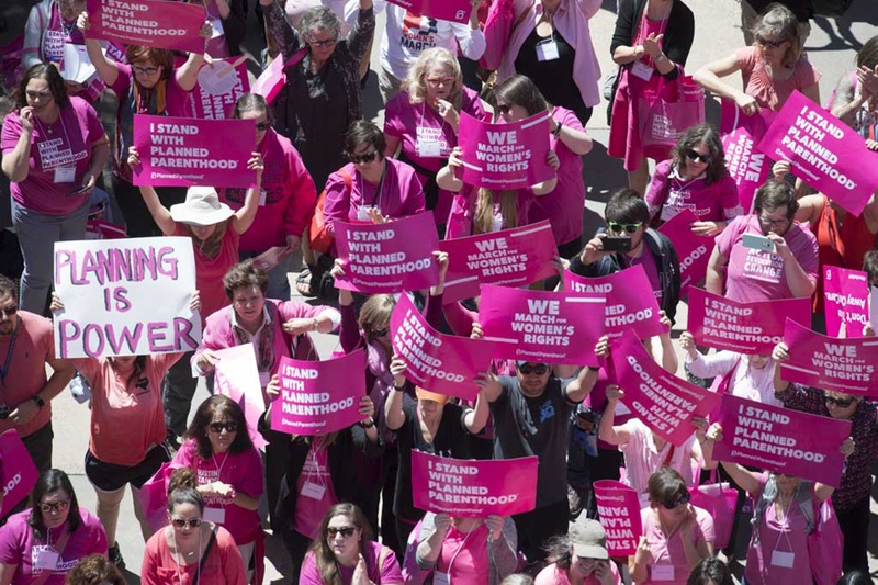 Supporters of Planned Parenthood gather at the the Capitol in Austin