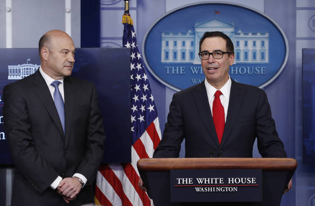 Treasury Secretary Steven Mnuchin joined by National Economic Director Gary Cohn speaks in the briefing room of the White House in Washington Wednesday