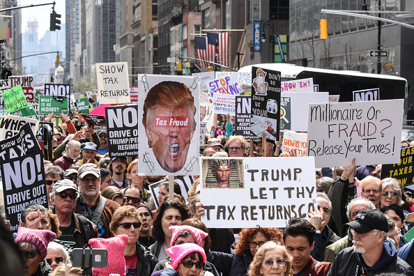 Tax day protesters feud with police, Trump supporters